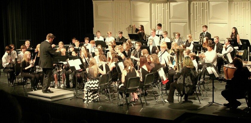 Steven OlsonPequot Lakes High School band director Michael Sommerness prompts the Concert Band into synch, beginning its precise rendition of a traditional march, "American Patrol," at the Pequot Lakes Bands In Concert program, "Marching toward Spring!", on Thursday, March 2, in the high school auditorium.