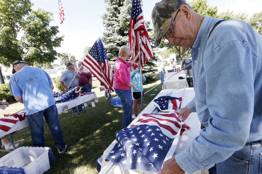 Flags of Valor to line path in Lake City Post Bulletin Rochester