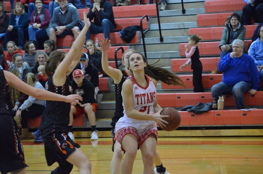 Trinity junior guard Bre Tessier eyes the basket after a baseline drive against New England on Monday, Feb. 5 from the Knights of Columbus Activities Center. (Patrick Bernadeau/The Dickinson Press)