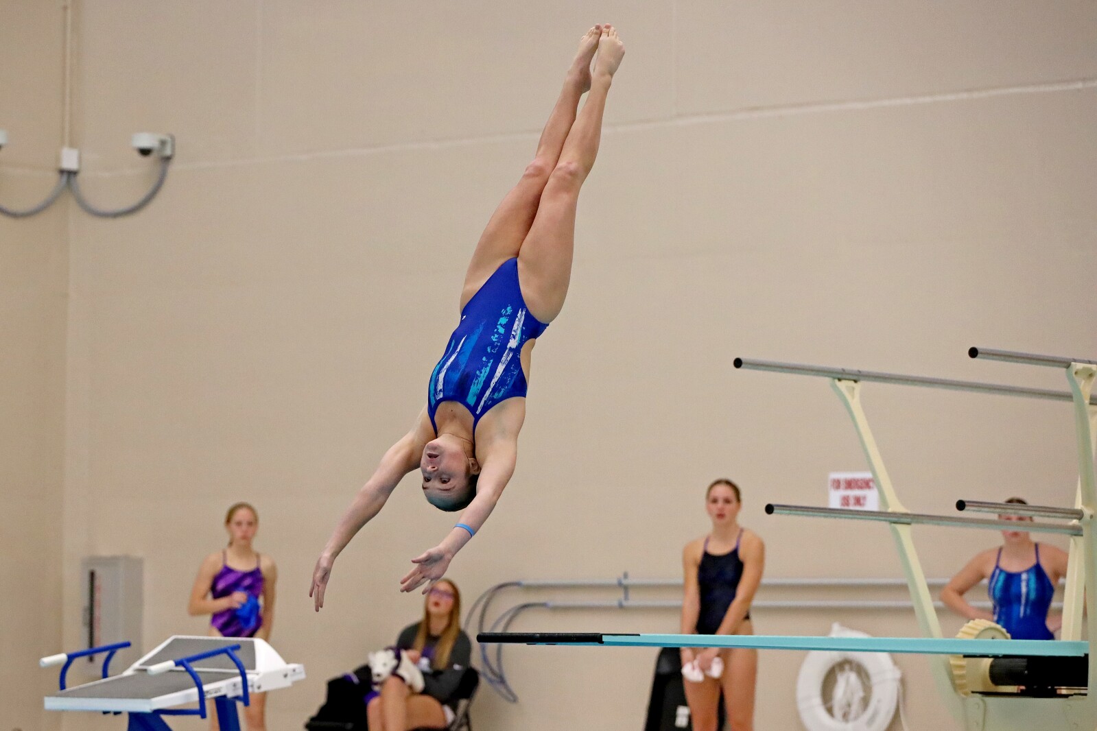 Izzy Olson diving.