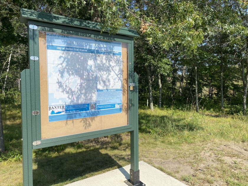A hiking trail sign near where the new park will be developed.