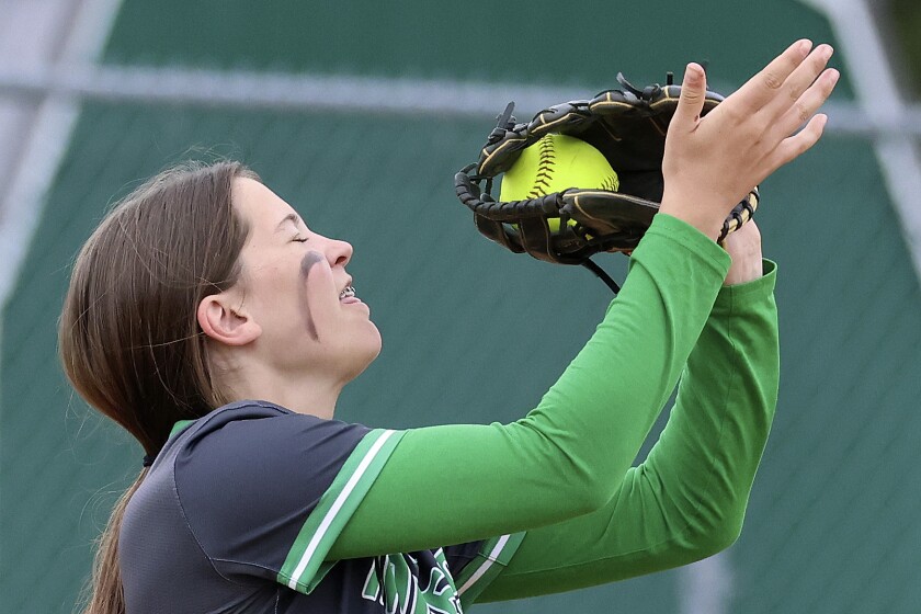 Softball action.