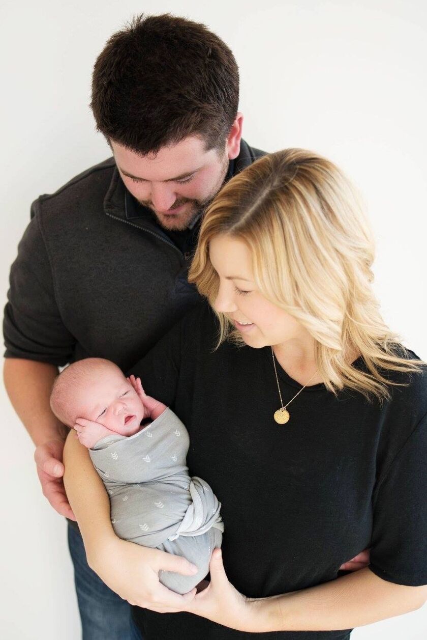 Karli_The Mochs with their new baby, Dawnson, in 2016.jpg