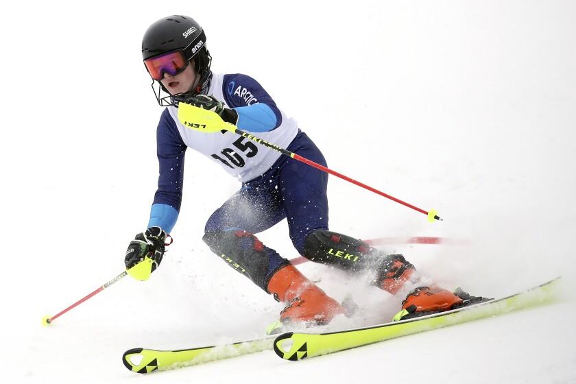 Skier makes a turn.