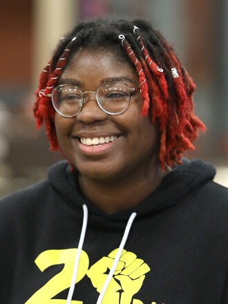 Sariyah Crawford, a senior at Duluth Denfeld High School, smiles while she talks about school resource officers during an interview