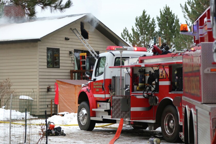 Pillager and Brainerd Fire Departments respond to a chimney fire Friday afternoon near Pillager. Kelly Humphrey/Brainerd Dispatch