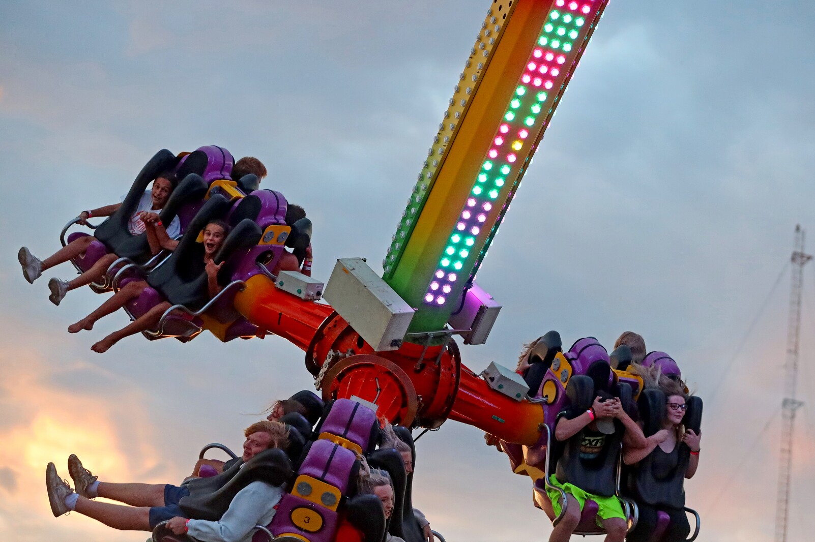 People enjoy the midway at the Crow Wing County Fair.