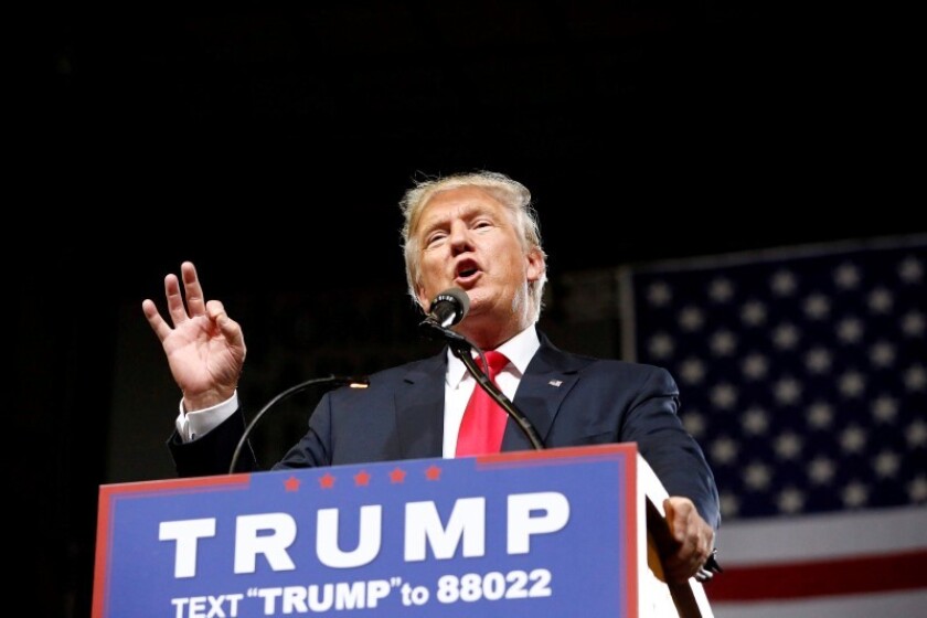 Republican U.S. Presidential candidate Donald Trump speaks at a campaign rally in Phoenix, Arizona, June 18, 2016. REUTERS/Nancy Wiechec