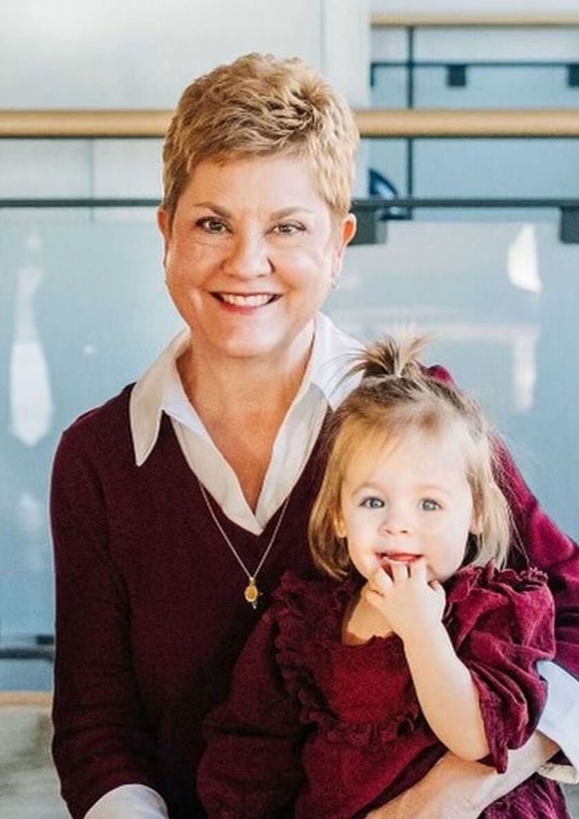 Mary Kay Schott and grandchild Annie.jpg