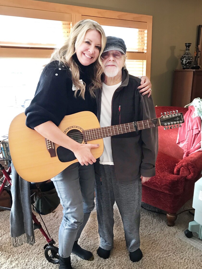 Sara Severson with hospice patient, Kirk Williams