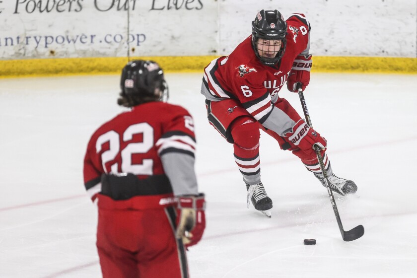 high school boys play hockey