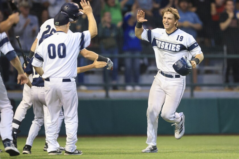 college men play baseball