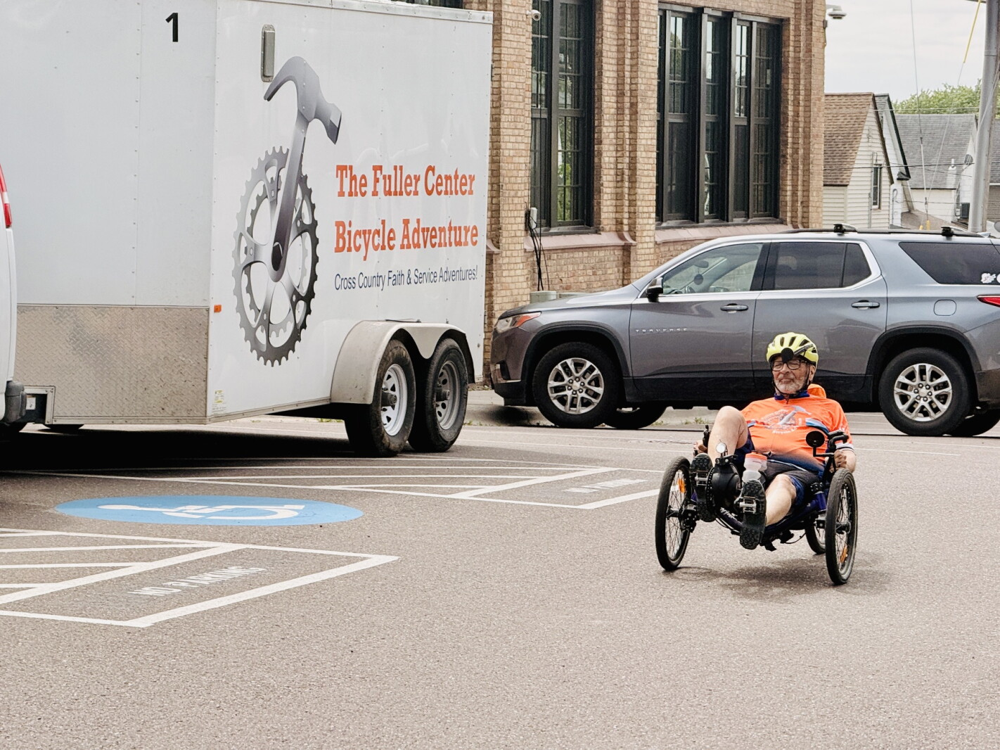 Cyclist finds purpose in pedaling for poverty housing