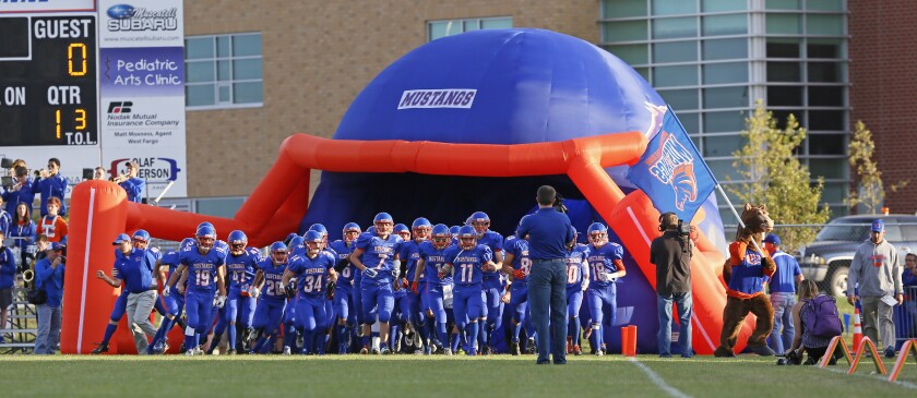 The booster clubs from West Fargo High School and West Fargo Sheyenne High School could be joining forces to raise money to install artificial turf on the schools' two football fields. David Samson / The Forum