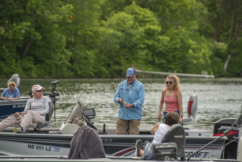 WOW with, left to right, Sharon Brandvold (background), Carla St. Germain, Kevin Mjelstad, Jennifer Carlson and Deb Wald (seated).jpg