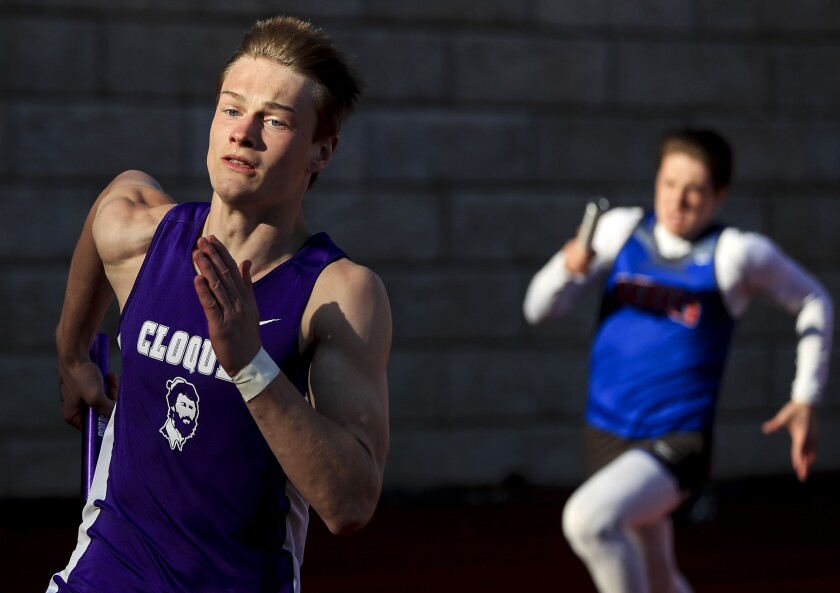 Runner competes in a relay race