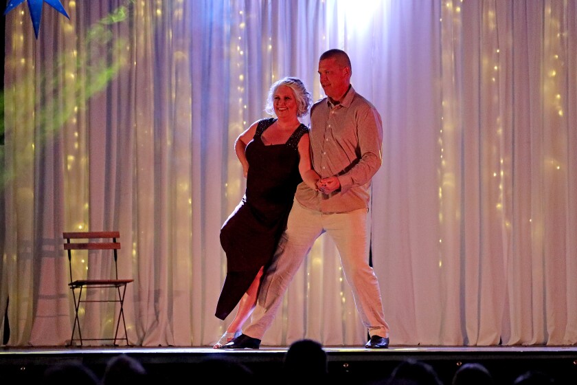 Dancer perform on stage.