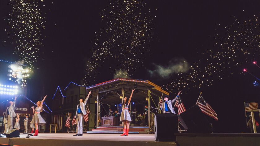 The cast of the "Medora Musical" perform in a grand finale with fireworks during a previous showing.