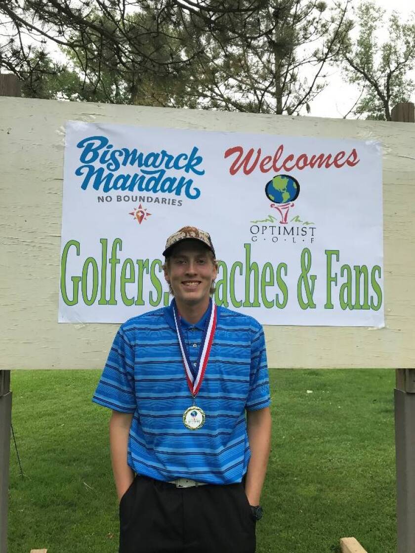 Dickinson High's Hunter Myran flashes a smile after placing first among 16-18 year-old golfers at the Optimist Junior Golf District Qualifier on June 16 at Riverwood Golf Course in Bismarck. (Submitted by Lisa Myran)