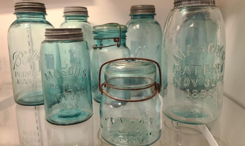 Vintage canning jars on display at New Generations of Harmony.jpg