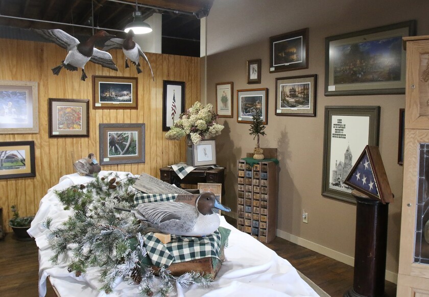 Warehouse West frame shop decoys n art to sell 021622.jpg