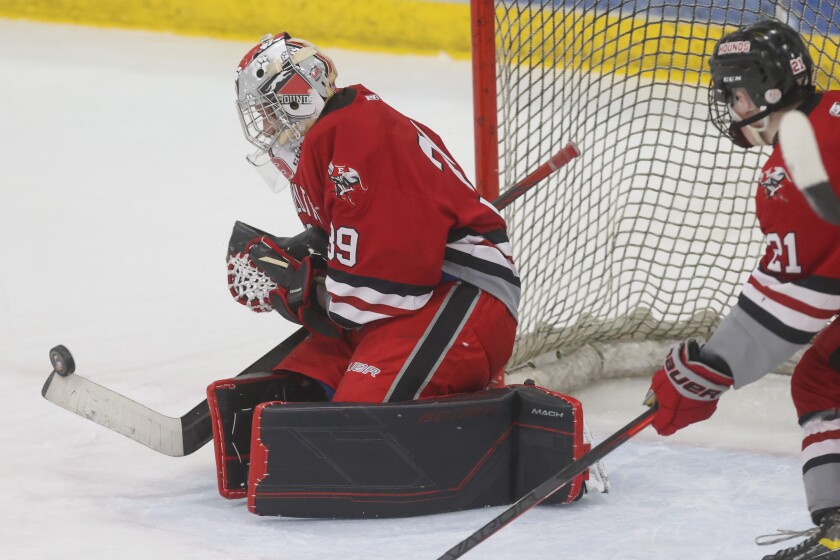 high school boys play hockey