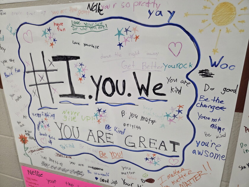 Poster with positive messages and #I.you.We in the middle.