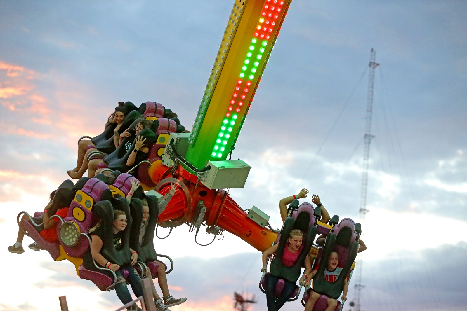 People enjoy the midway at the Crow Wing County Fair.