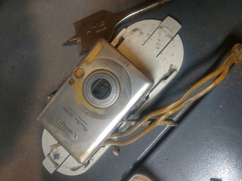 Two Harbors photographer Christian Dalbec is trying to find the owner of this camera that he found while scuba diving in Lake Superior near the Apostle Islands sea caves on Wednesday. Photo courtesy of Christian Dalbec