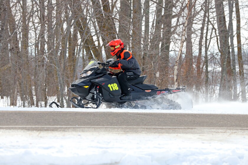 Snowmobilers race