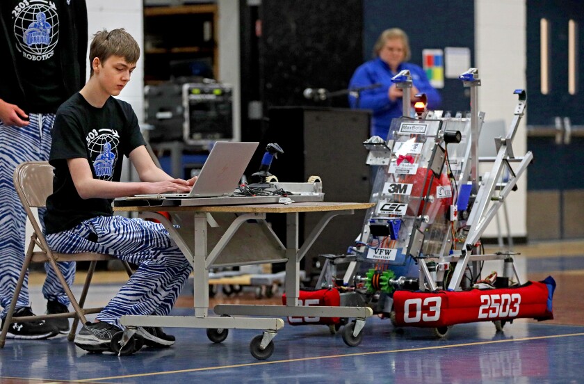 The Brainerd High School robotics team shows off the robot they built at a pep fest Friday, May 20, 2022, at the BHS gym.