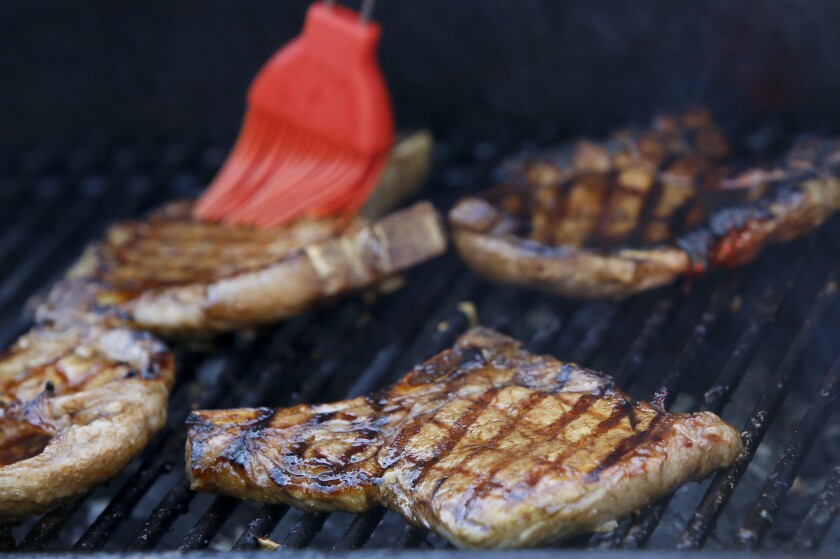 Soy Basted Pork Chops offer a flavorful, yet easy meal to make on a summer evening. Michael Vosburg / Forum Photo Editor