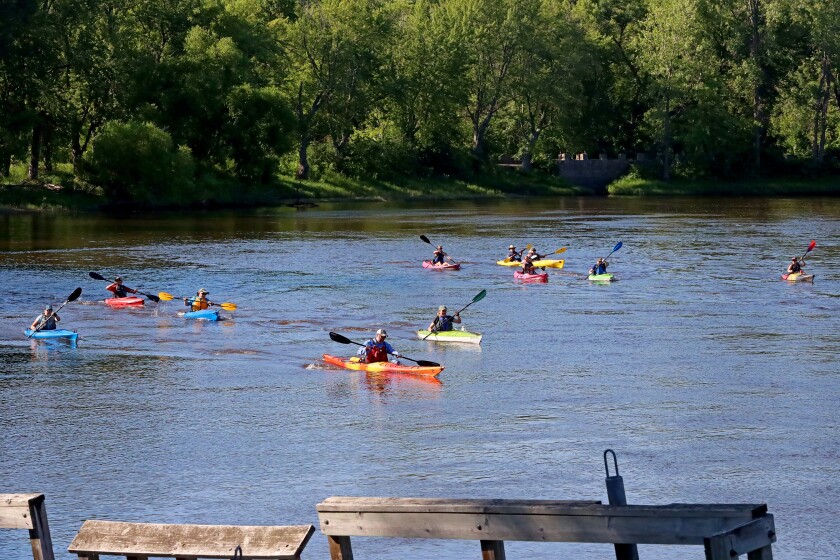Racers head up the Mississippi River on Saturday, July 30, 2022, going from Kiwanis Park to Evergreen Landing and back again in Brainerd.