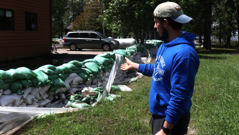 Resort co-owner surveys the flood aftermath