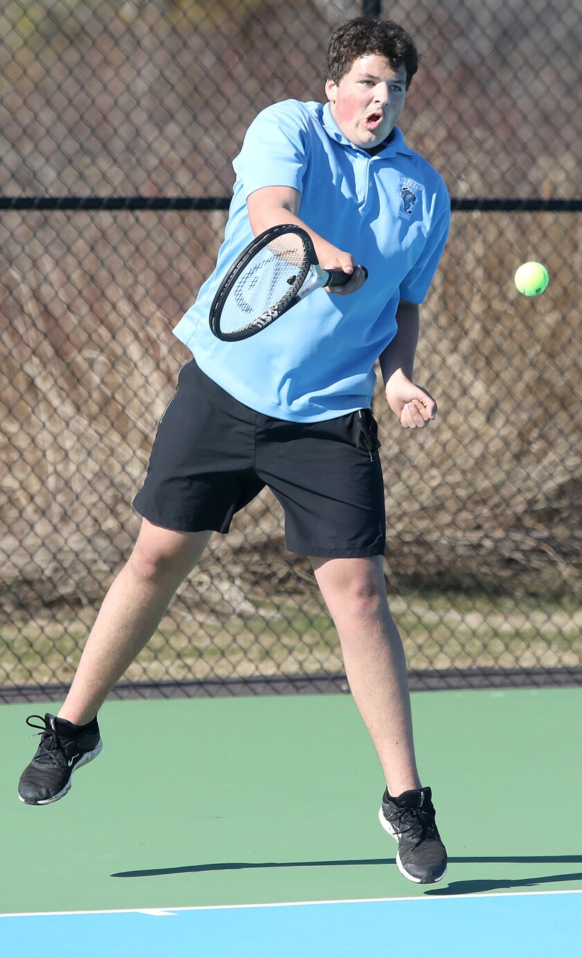 Superior's Jordan Hoffman returns a shot