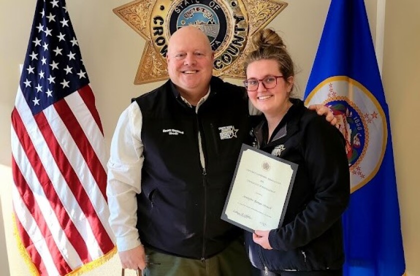 Crow Wing County Sheriff Scott Goddard and Central Lakes College Student Jennifer Strack.