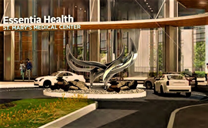 A computer rendering shows large silver sculpture, with interlocking waves, in the middle of a driveway circled by cars in front of a door with signage reading ESSENTIA HEALTH ST. MARY'S MEDICAL CENTER.