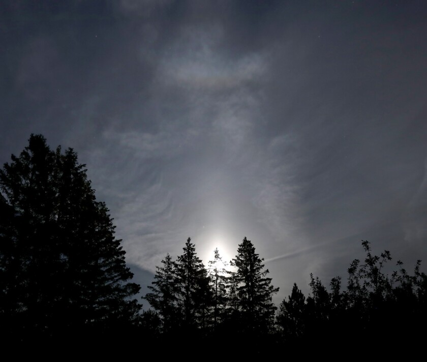 Full moon pillar and arc
