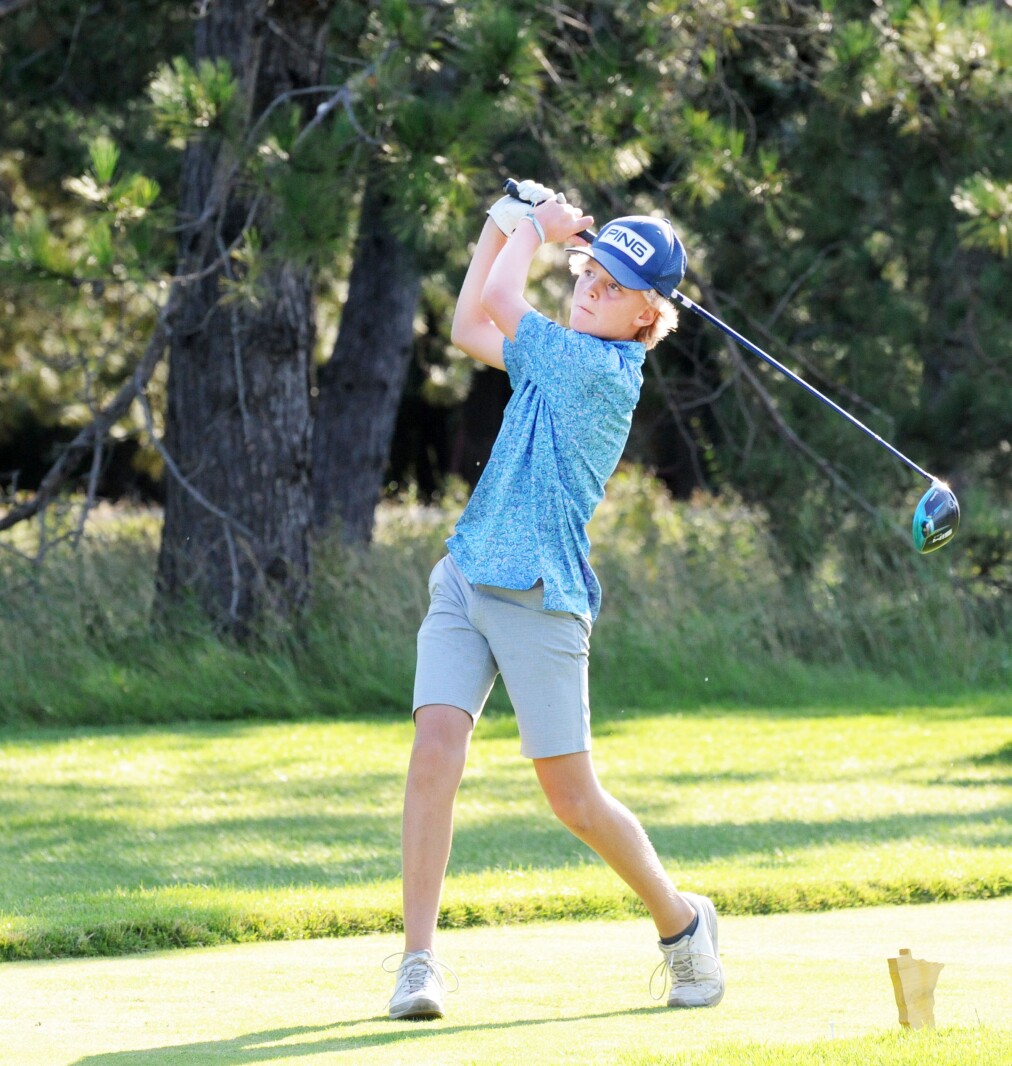 Garrison Johnson hits a drive down the No. 11 during his 5-4 Jun