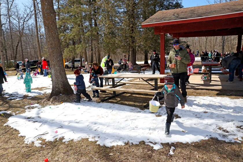 Families enjoy the Annual Lake Shore Easter Egg Hunt Saturday, April 17, 2022, at Fritz Loven Park.