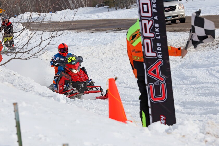 Snowmobilers race