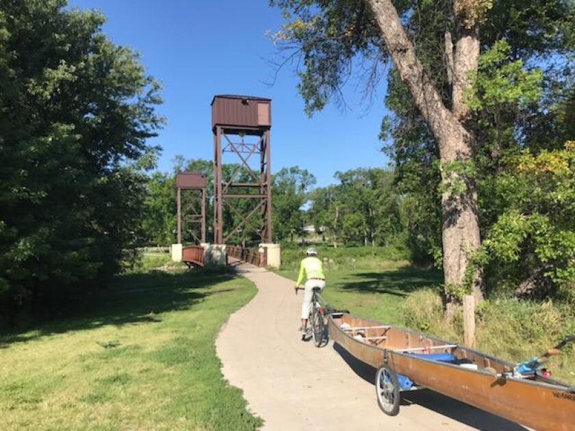 Tony towing canoe.jpg