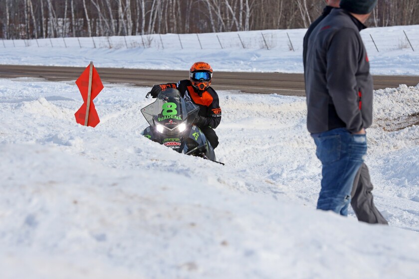 Snowmobilers race