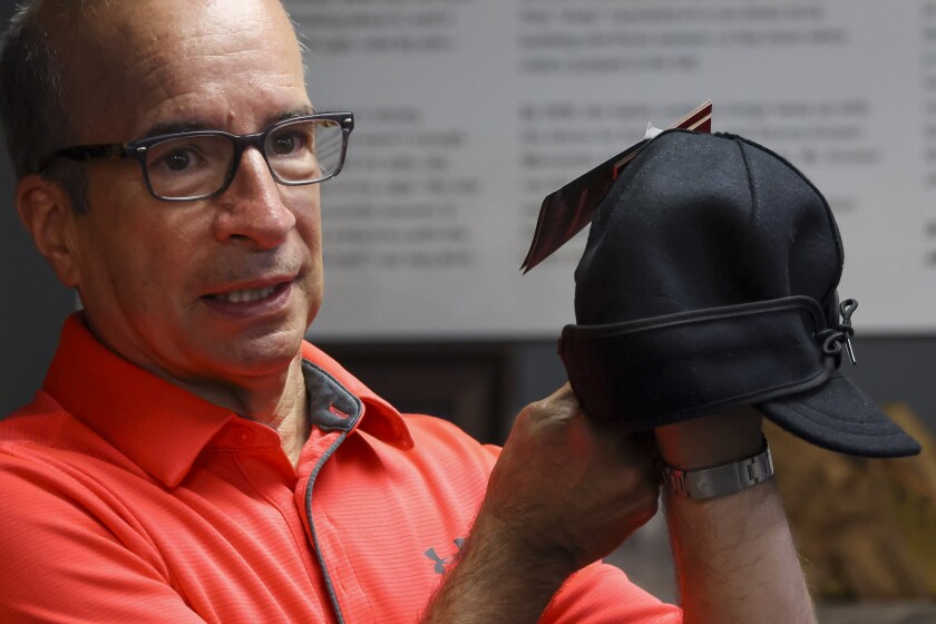 Wool caps with ear bands being made in factory