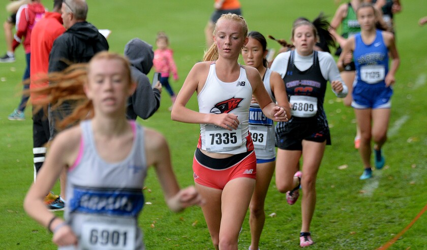 Willmar junior Madi Engstrom keeps up with the pack during the Willmar Invitational on Saturday, Oct. 1, 2022 at Eagle Creek Golf Club in Willmar.