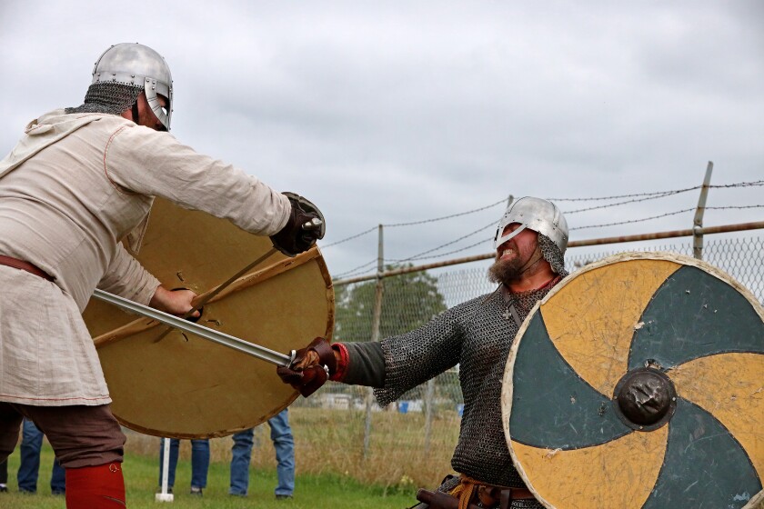 Viking warriors take part in a battle demonstration.