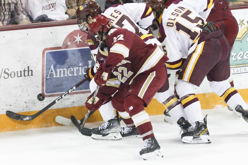 college men play hockey