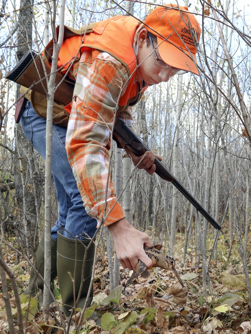 hunter with woodcock