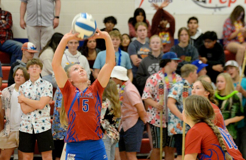 KMS junior Olivia Noble, 5, lobs the ball up for a set during a Camden Conference match against CMCS on Thursday, Sept. 29, 2022 in Kerkhoven.