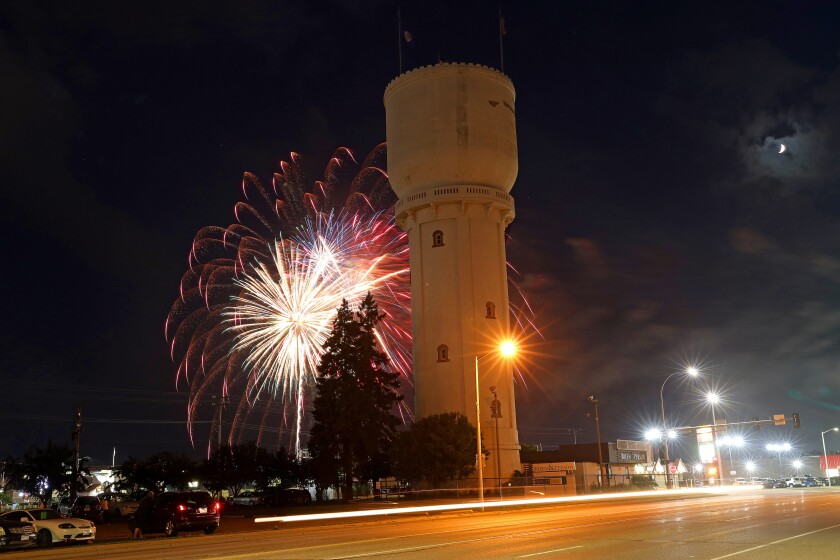 Fireworks light up the sky for the Fourth of July on Monday, July 4, 2022, beyond the historic water tower in Brainerd.